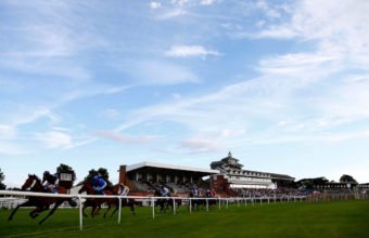 Runners pass the stands at Thirsk