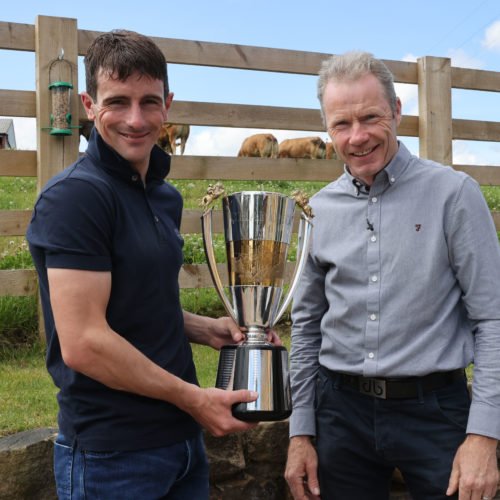 Brian Hughes - under starters orders. Pictured with the Champion Jump Jockey Trophy and Mick Fitzgerald