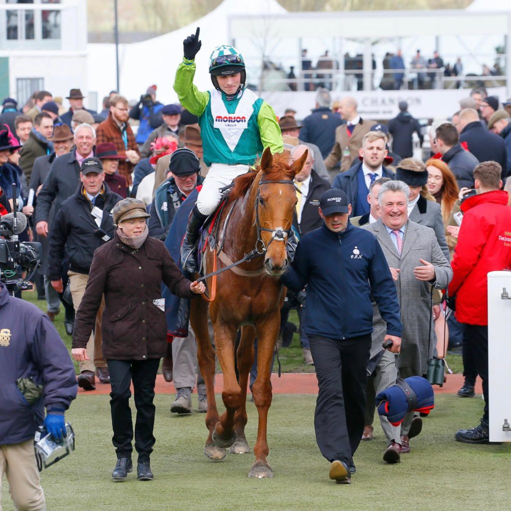 Harry Cobden wins the 2019 RSA Chase at Cheltenham with Topofthegame