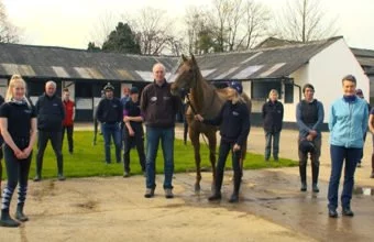 Grand National contender Vieux Lion Rouge with their team