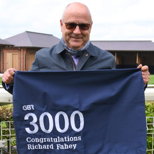 Richard Fahey with his 3000 winners saddle cloth
