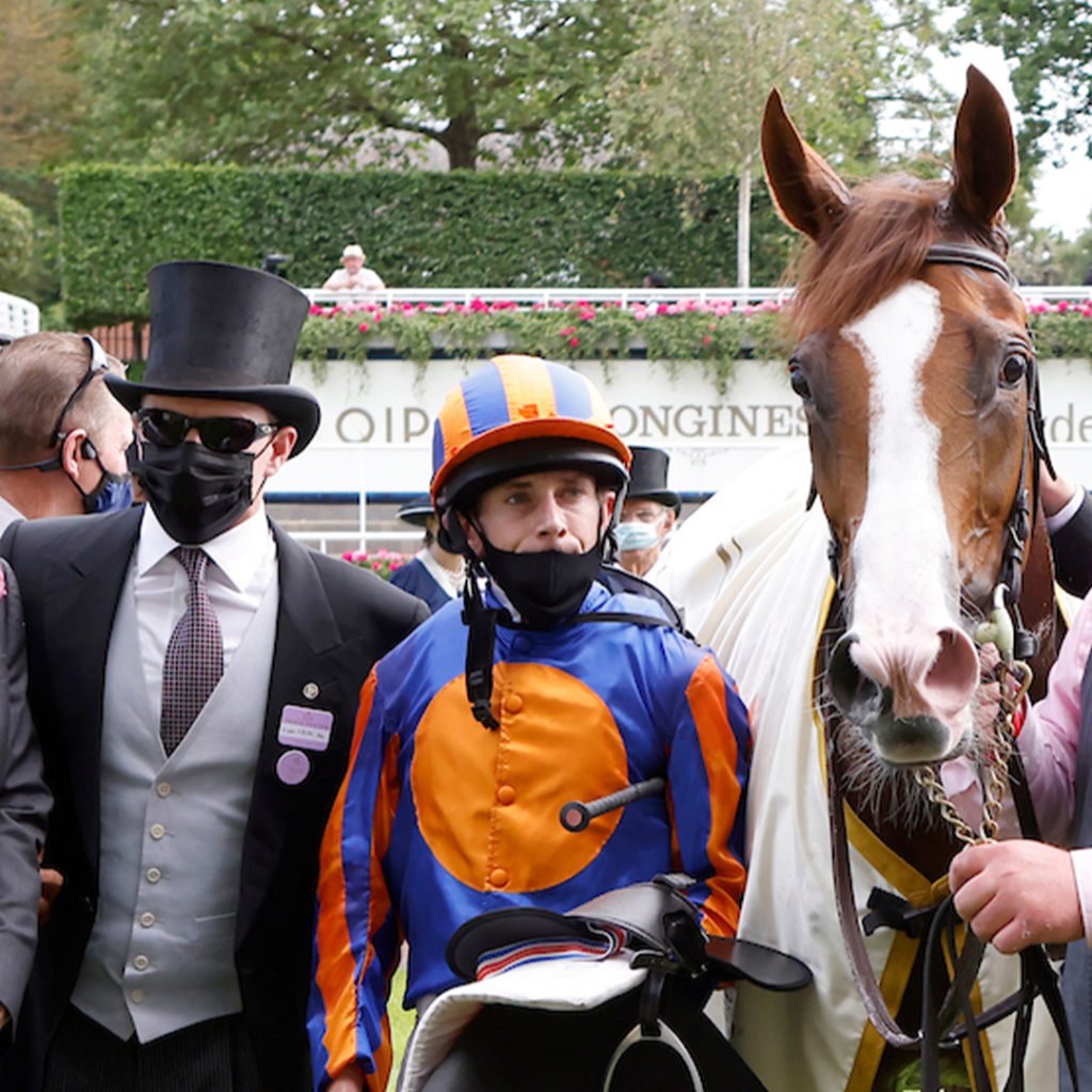 Aidan O'Brien, Ryan Moore and Love after winning the Prince Of Wales's Stakes