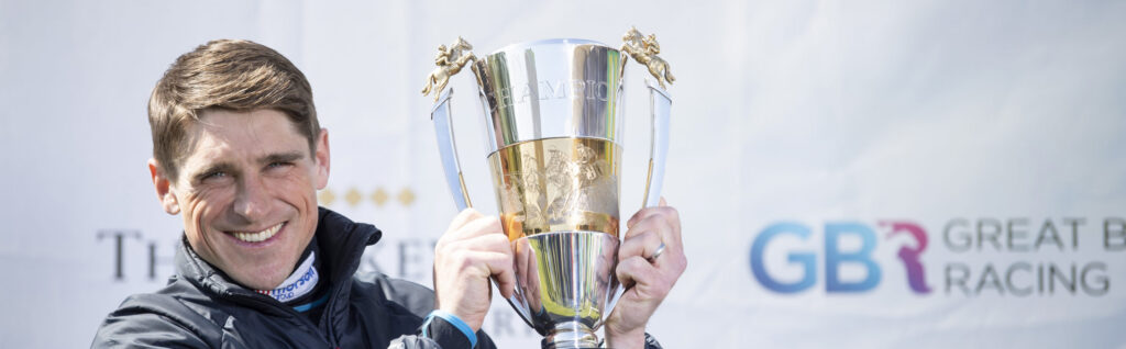 Harry Skelton with the champion jump jockey trophy