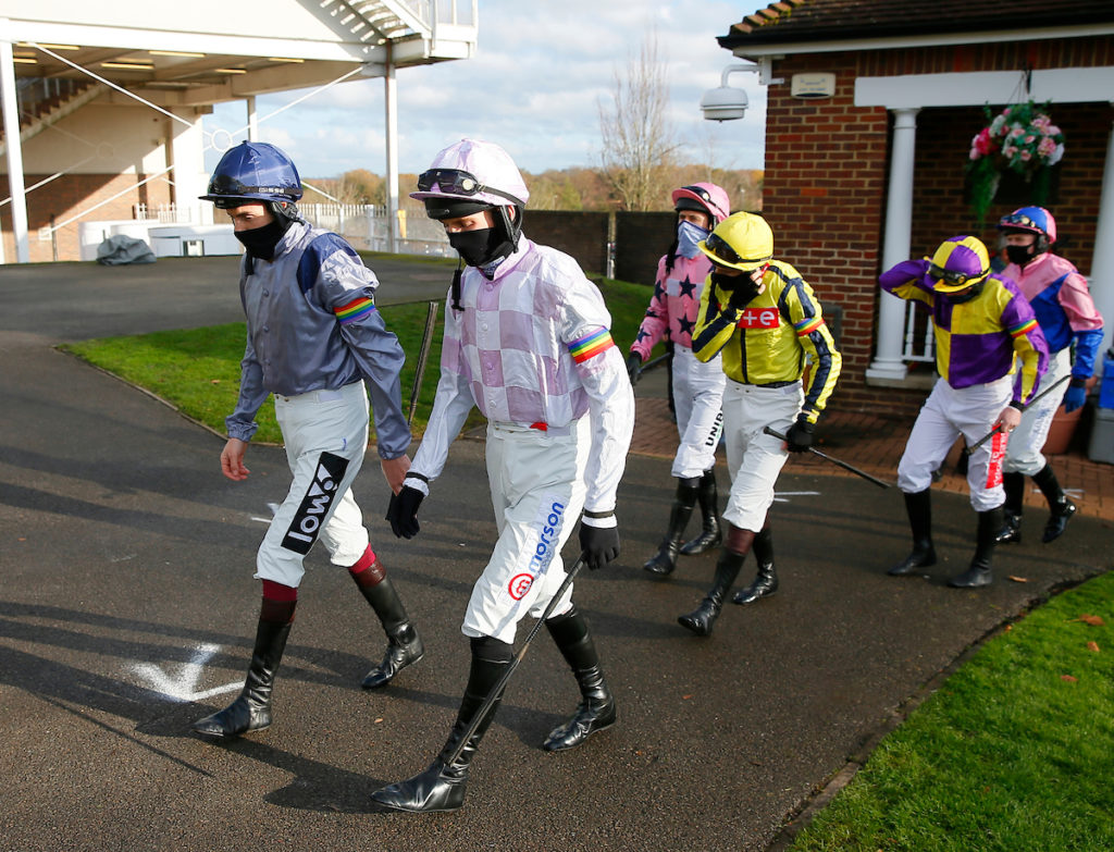 Jockey's wear rainbow armband