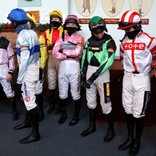 Racing Is Everyone's Sport. Jockeys' sporting rainbow armbands. The importance of allies