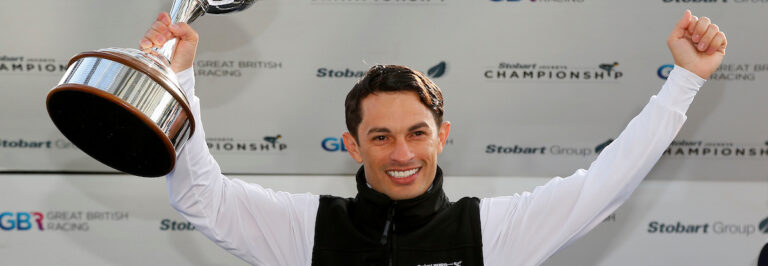 Silvestre De Sousa with the Champion Jockey trophy