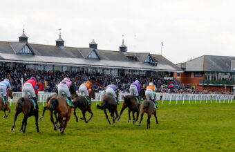 Runners in The bet365 Scottish County Hurdle passing the stands at Musselburgh