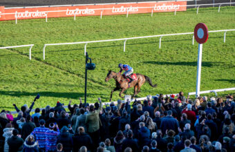 Paisley Park and Aidan Coleman passing the winners post clear of the field