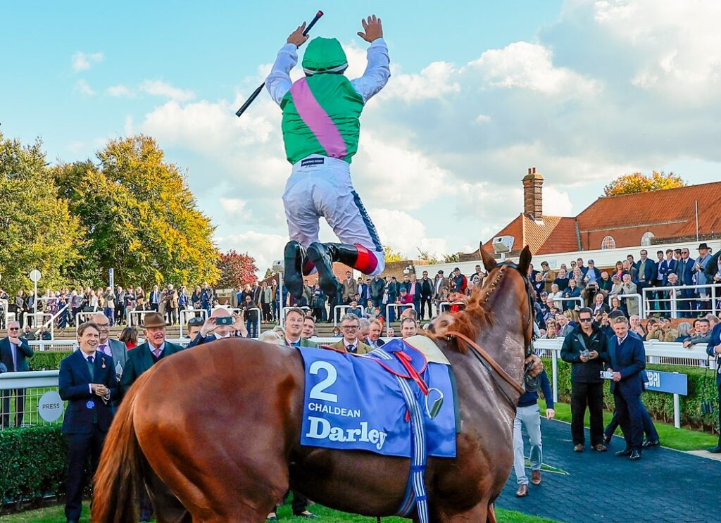 Frankie Dettori mid iconic leap
