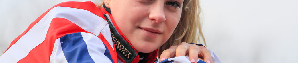 Lilly Pinchin leant posing on her helmet