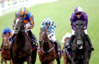 Auguste Rodin and Ryan Moore on their way to victory just ahead of King of Steal in 2023