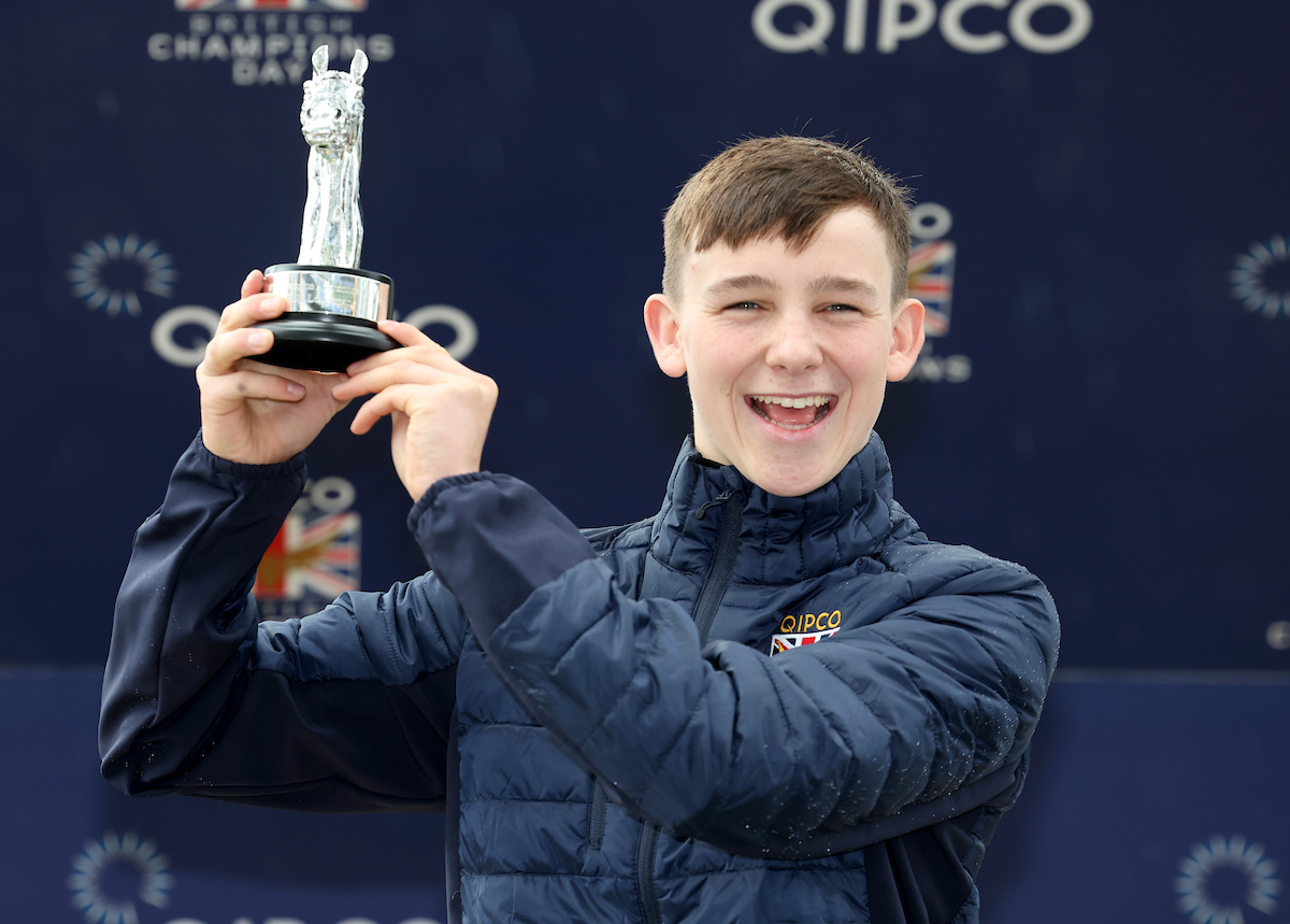 Billy Loughnane ecstatic with the champion apprentice trophy at ascot