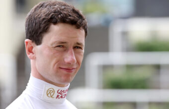 Oisin Murphy giving a slight smile to the camera