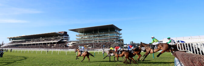 The field jumping in front of the grandstands