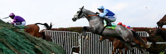 Resplendent Grey and Sean Bowen winning The Gold Cup Handicap Chase at Sandown